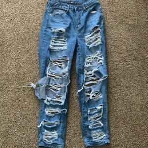 Ripped distressed straight leg jeans